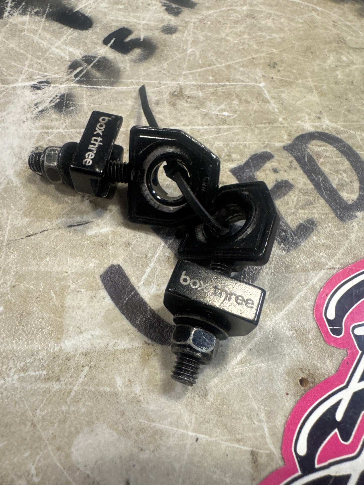 Box three chain tensioners